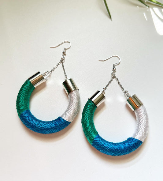 Vela hoop earrings wrapped in premium thread