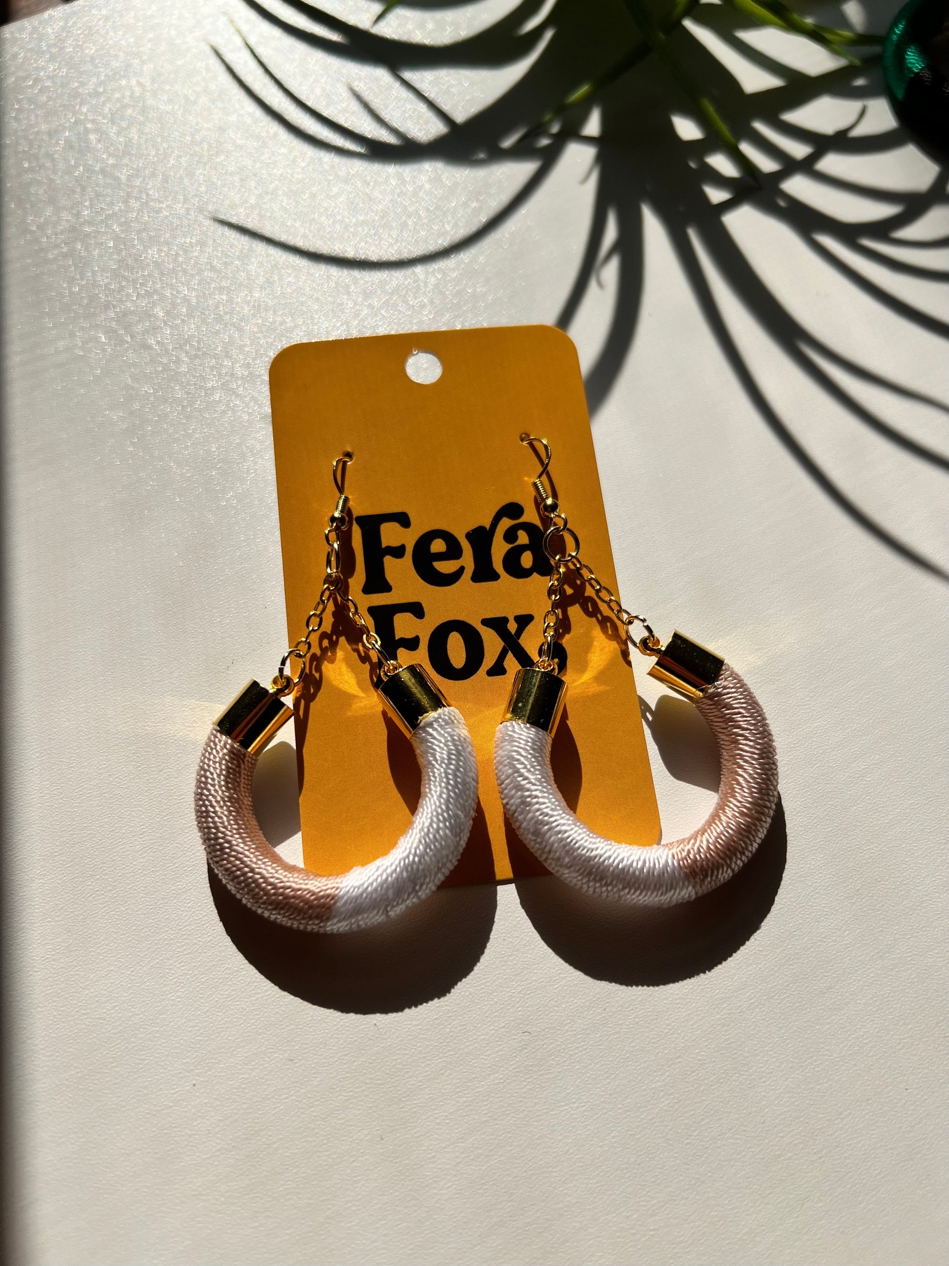 Vela hoop earrings wrapped in premium thread